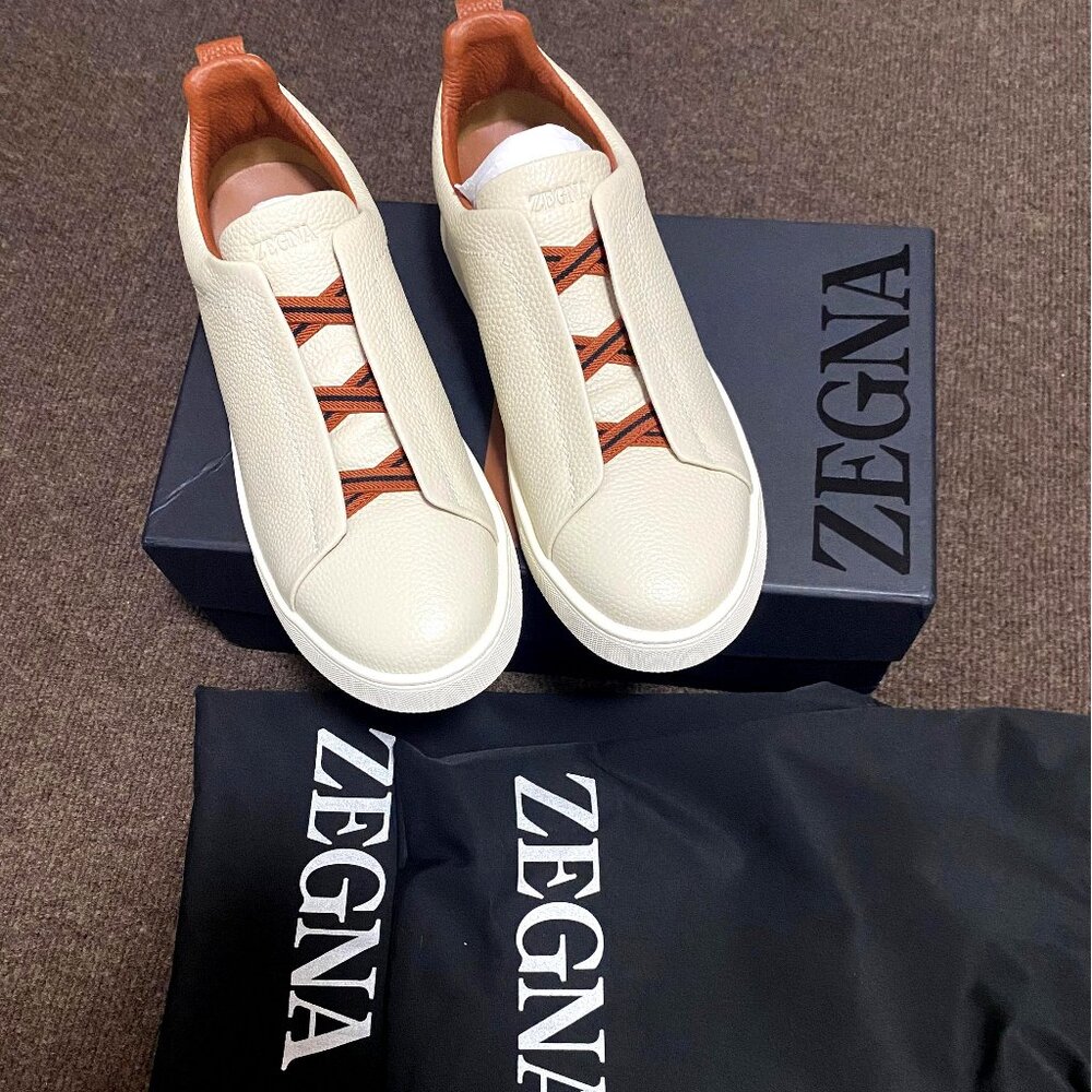 Off-white deerskin Triple Stitch™ sneakers are made from soft material for a mod